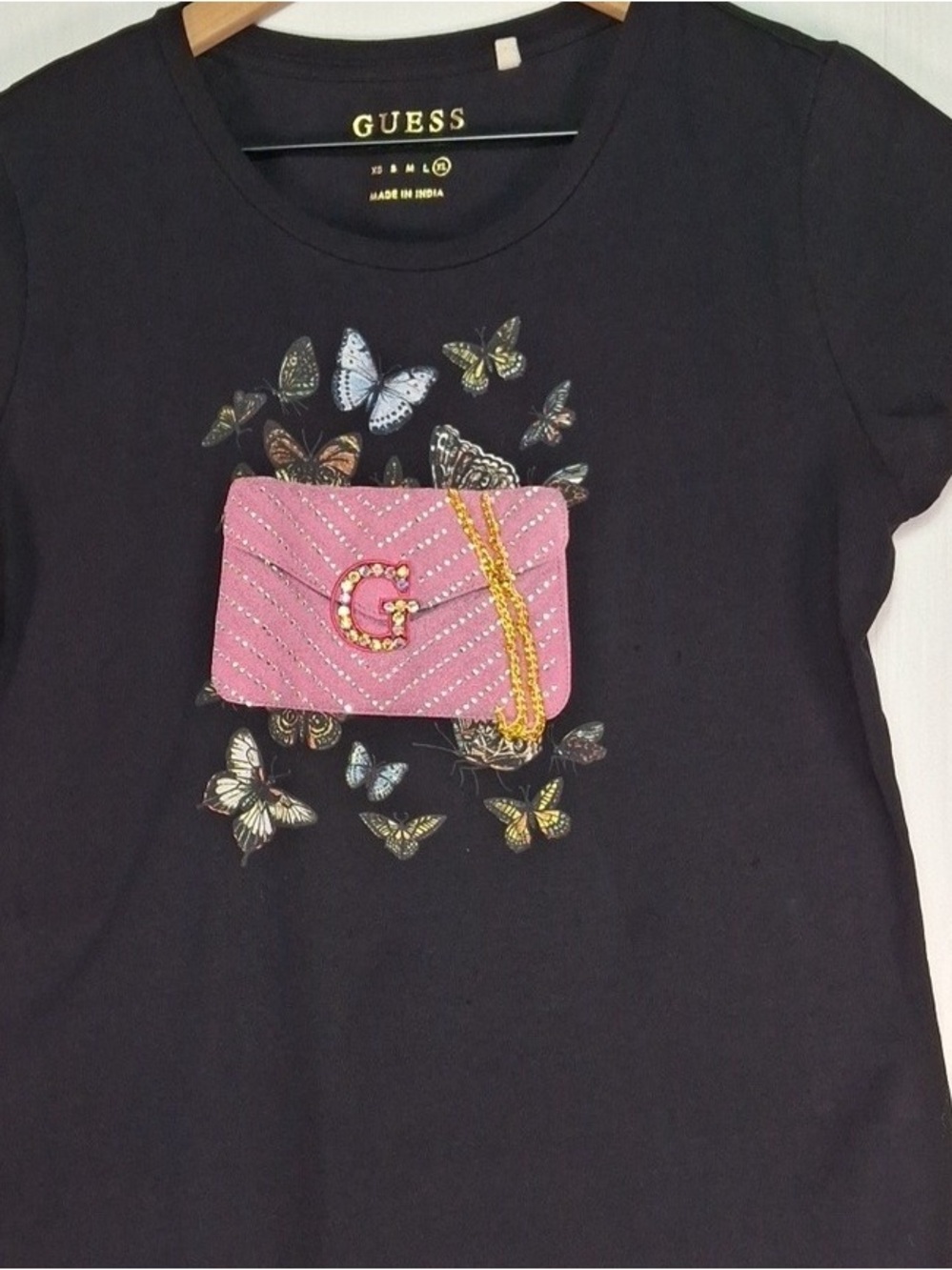 GUESS Black Short Sleeve Tee with Pink Embellished Purse & Butterfly Motif